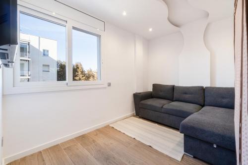 Mini salón con TV en apartamento turístico en Salou